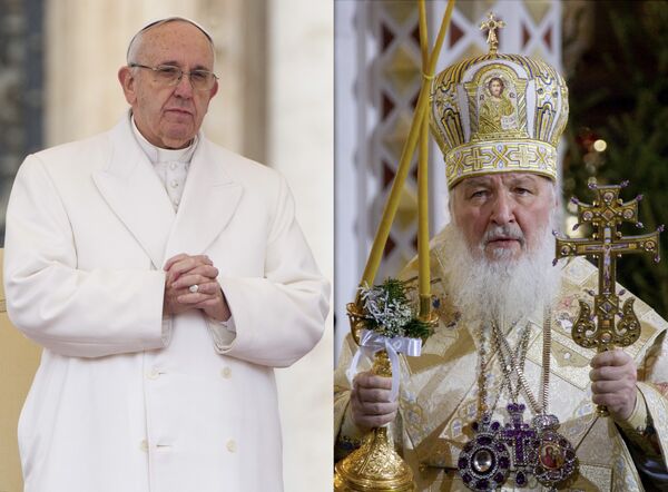 FILE - In this file photo combination Russian Orthodox Patriarch Kirill, right, serves the Christmas Mass in the Christ the Savior Cathedral in Moscow, Russia, on Thursday, Jan. 7, 2016 and Pope Francis prays during an audience at the Vatican on Saturday, Jan. 30, 2016 FILE - In this file photo combination Russian Orthodox Patriarch Kirill, right, serves the Christmas Mass in the Christ the Savior Cathedral in Moscow, Russia, on Thursday, Jan. 7, 2016 and Pope Francis prays during an audience at the Vatican on Saturday, Jan. 30, 2016 - Sputnik International
