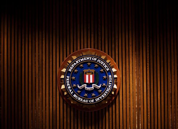 A crest of the Federal Bureau of Investigation is seen 03 August 2007 inside the J. Edgar Hoover FBI Building in Washington, DC. A crest of the Federal Bureau of Investigation is seen 03 August 2007 inside the J. Edgar Hoover FBI Building in Washington, DC. - Sputnik International
