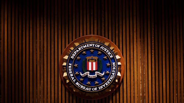 A crest of the Federal Bureau of Investigation is seen 03 August 2007 inside the J. Edgar Hoover FBI Building in Washington, DC. - Sputnik International