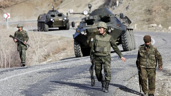Turkish soldiers patrol a road near the Turkey-Iraq border in the mainly Kurdish southeastern province of Sirnak (File) - Sputnik International