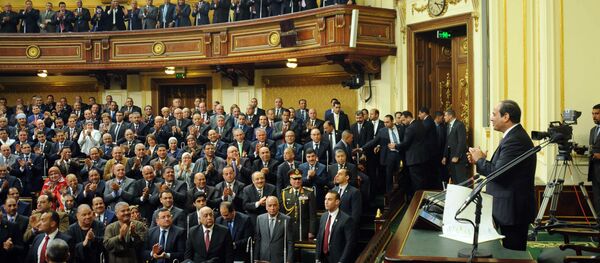 In this photo provided by Egypt's state news agency MENA, Egyptian President Abdel-Fattah el-Sissi, addresses parliament in Cairo, Egypt, Saturday, Feb. 13, 2016 - Sputnik International