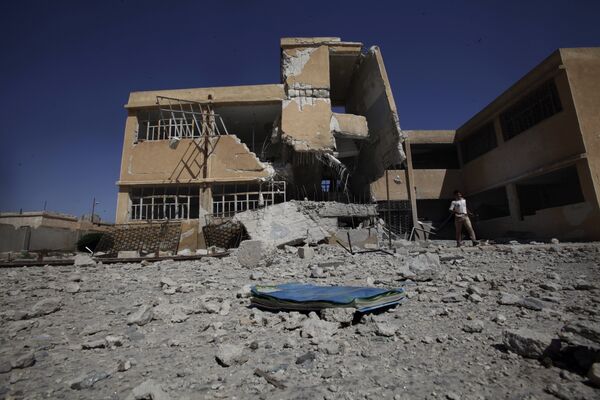 A book is left on the ground at the yard of a school in Tel Rifaat, on the outskirts of Aleppo, Syria. File photo A book is left on the ground at the yard of a school in Tel Rifaat, on the outskirts of Aleppo, Syria. File photo - Sputnik International