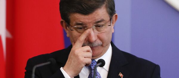 Turkish Prime Minister Ahmet Davutoglu attends a news conference after a meeting with his Ukrainian counterpart Arseny Yatseniuk in Kiev, Ukraine, February 15, 2016. - Sputnik International