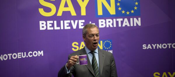 Nigel Farage, the leader of the UK Independence Party (UKIP), poses for photographers after speaking at the launch of their Say No to the EU. - Sputnik International