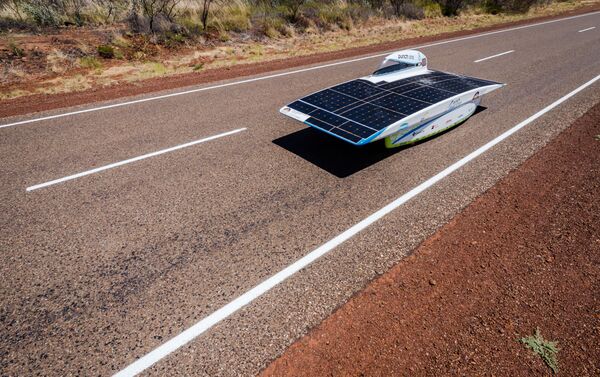 The Punch Powertrain Solar Team car from Belgium competes during the second day of the 2015 World Solar Challenge near Elliott, Australia. (File) The Punch Powertrain Solar Team car from Belgium competes during the second day of the 2015 World Solar Challenge near Elliott, Australia. (File) - Sputnik International