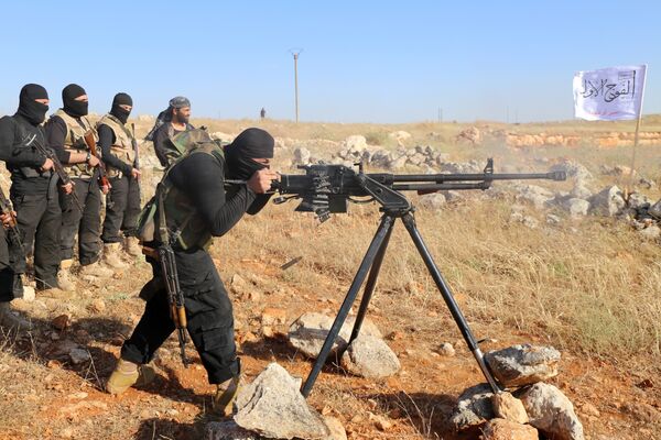 Rebel fighters from the First Battalion under the Free Syrian Army take part in a military training on June 10, 2015, in the rebel-held countryside of the northern city of Aleppo Rebel fighters from the First Battalion under the Free Syrian Army take part in a military training on June 10, 2015, in the rebel-held countryside of the northern city of Aleppo - Sputnik International