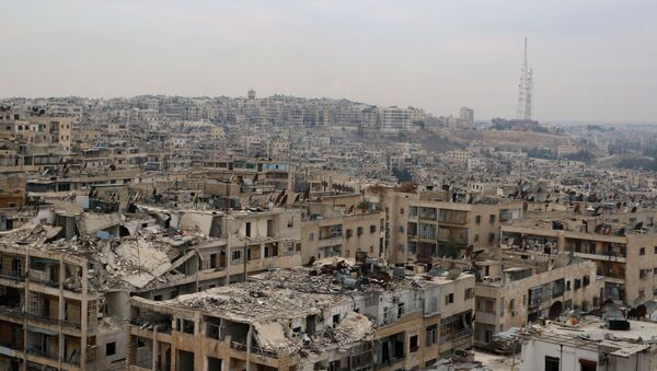 A picture taken on November 24, 2014, shows damaged buildings in the rebel-held Ansari disctrict of the northern Syrian city of Aleppo. - Sputnik International