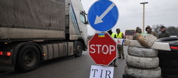 Ukrainian activists block vans with Russian identification numbers at a checkpoint in Lviv Region. Ukrainian activists block vans with Russian identification numbers at a checkpoint in Lviv Region. - Sputnik International