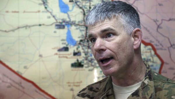 Baghdad-based spokesman for the US-led coalition in Iraq Col. Steve Warren speaks during an interview with The Associated Press in Baghdad, Iraq. - Sputnik International