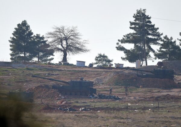 Soldiers carry ammunition as Turkish artillery fire from the border near Kilis toward northern Syria, in Kilis, Turkey, Monday, Feb. 15, 2016 Soldiers carry ammunition as Turkish artillery fire from the border near Kilis toward northern Syria, in Kilis, Turkey, Monday, Feb. 15, 2016 - Sputnik International
