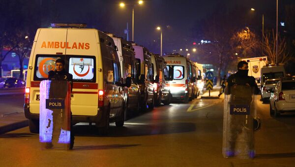 Turkish police secure the site of an explosion after an attack targeted a convoy of military service vehicles in Ankara on February 17, 2016 - Sputnik International