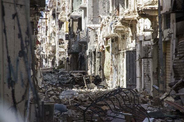 Street is filled with debris and abandoned houses in the city of Benghazi, Libya (File) Street is filled with debris and abandoned houses in the city of Benghazi, Libya (File) - Sputnik International
