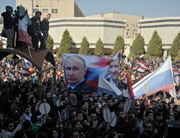 Al-Baath University students hold rally in support of Russia's military operation in Syria Al-Baath University students hold rally in support of Russia's military operation in Syria - Sputnik International