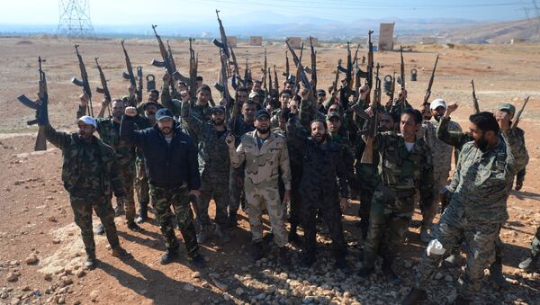 Self-defense fighters in Syria. File photo - Sputnik International