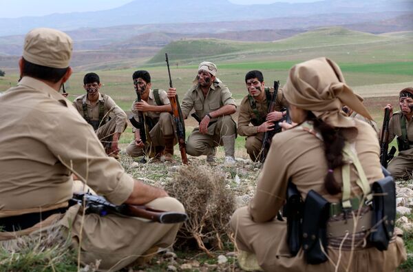 Iranian Kurdish Peshmerga members of the Democratic Party of Iranian Kurdistan take part in routine military exercises in Koya, 100 kms north of Arbil, the capital of the autonomous Kurdish region of northern Iraq, file photo. Iranian Kurdish Peshmerga members of the Democratic Party of Iranian Kurdistan take part in routine military exercises in Koya, 100 kms north of Arbil, the capital of the autonomous Kurdish region of northern Iraq, file photo. - Sputnik International
