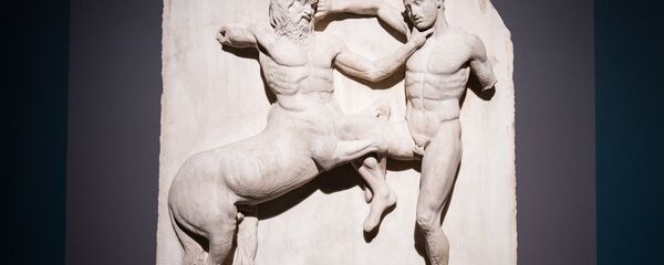 A marble metope sculpture (447-438BC) from the Parthenon in Athens, part of the collection that is popularly referred to as the Elgin Marbles, depicting a battle between a Centaur and a Lapith. A marble metope sculpture (447-438BC) from the Parthenon in Athens, part of the collection that is popularly referred to as the Elgin Marbles, depicting a battle between a Centaur and a Lapith. - Sputnik International