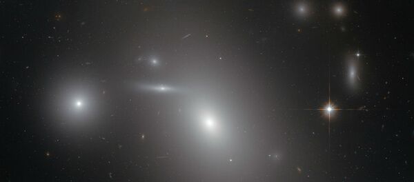 Located near this photos center is NGC 4889. - Sputnik International