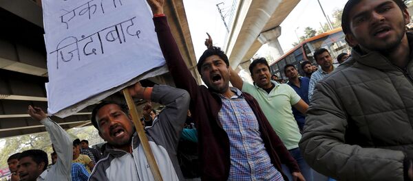 Demonstrators from the Jat community shout slogans during a protest in New Delhi, India, February 21, 2016 Demonstrators from the Jat community shout slogans during a protest in New Delhi, India, February 21, 2016 - Sputnik International