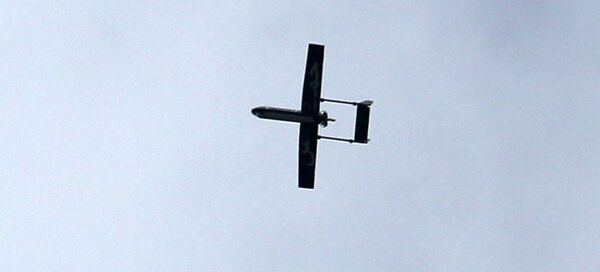 A drone belonging to the Ezzedine al-Qassam Brigades, Hamas' armed wing, flies over Gaza City on December 14, 2014 A drone belonging to the Ezzedine al-Qassam Brigades, Hamas' armed wing, flies over Gaza City on December 14, 2014 - Sputnik International