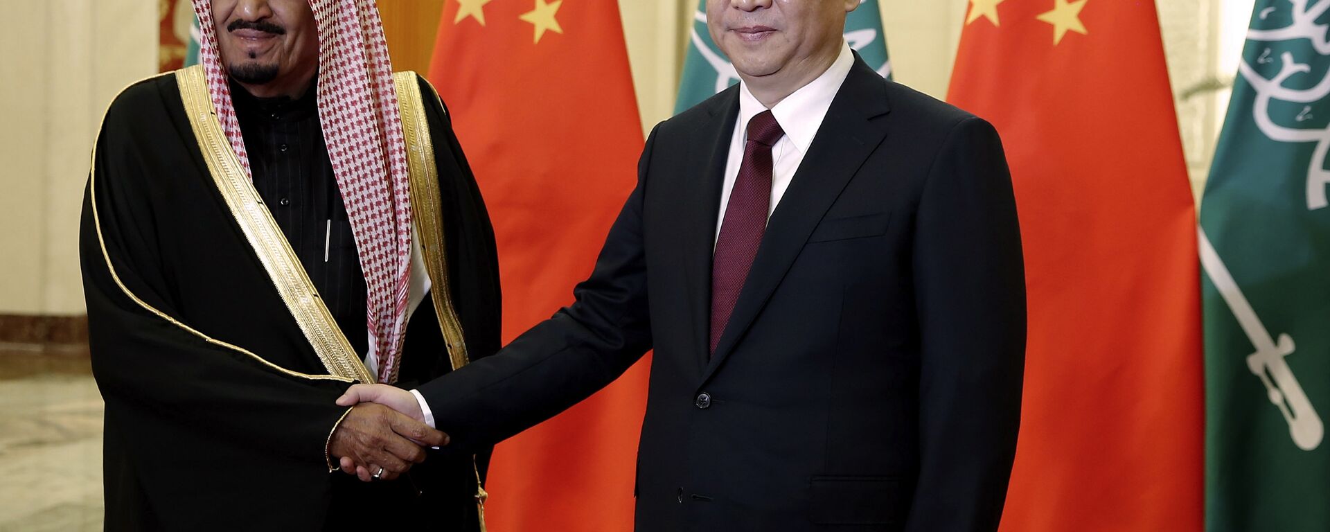 Chinese President Xi Jinping, right, shakes hands with Saudi Prince Salman bin Abdul-Aziz as they pose for photos at the Great Hall of the People in Beijing, China, Thursday, March 13, 2014 - Sputnik International, 1920, 07.11.2022