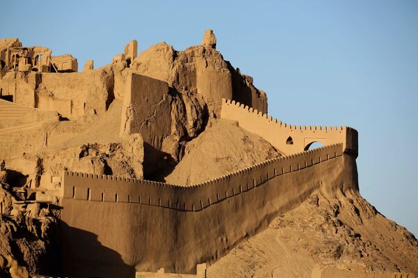 A general view of the citadel Arg'e Bam, the pre-Islamic desert citadel that was the largest adobe monument in the world made of non-baked clay bricks, a thousand kilometres (600 miles) southeast of Tehran A general view of the citadel Arg'e Bam, the pre-Islamic desert citadel that was the largest adobe monument in the world made of non-baked clay bricks, a thousand kilometres (600 miles) southeast of Tehran - Sputnik International