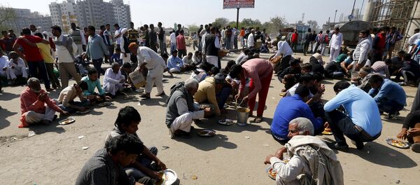 Demonstrators from the Jat community eat as they block the Delhi-Haryana national highway during a protest in New Delhi, India, February 21, 2016 Demonstrators from the Jat community eat as they block the Delhi-Haryana national highway during a protest in New Delhi, India, February 21, 2016 - Sputnik International