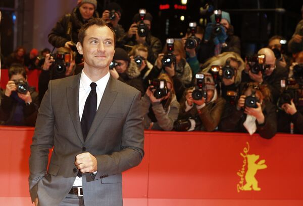Actor Jude Law poses for photographers upon arrival at the red carpet of the film 'Genius' during the 2016 Berlinale Film Festival in Berlin Actor Jude Law poses for photographers upon arrival at the red carpet of the film 'Genius' during the 2016 Berlinale Film Festival in Berlin - Sputnik International