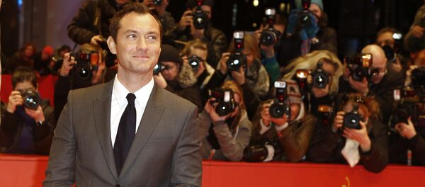 Actor Jude Law poses for photographers upon arrival at the red carpet of the film 'Genius' during the 2016 Berlinale Film Festival in Berlin Actor Jude Law poses for photographers upon arrival at the red carpet of the film 'Genius' during the 2016 Berlinale Film Festival in Berlin - Sputnik International