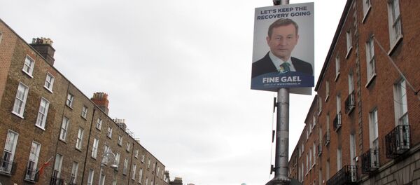 This photo taken Friday, Feb. 5, 2016, shows an election poster picturing Prime Minister Enda Kenny adorning a lamp post outside the headquarters of his Fine Gael party in Dublin, Ireland This photo taken Friday, Feb. 5, 2016, shows an election poster picturing Prime Minister Enda Kenny adorning a lamp post outside the headquarters of his Fine Gael party in Dublin, Ireland - Sputnik International
