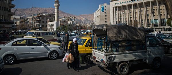 Pedestrians on a street in the Syrian capital Damascus Pedestrians on a street in the Syrian capital Damascus - Sputnik International