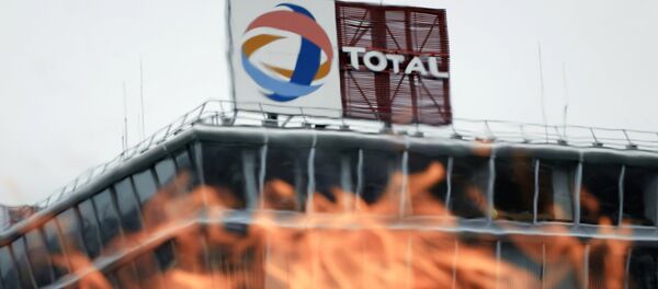 View taken of fire lit by employees of French oil giant Total (File) View taken of fire lit by employees of French oil giant Total (File) - Sputnik International