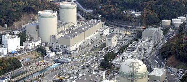 An aerial view shows No. 4 (front L), No. 3 (front R), No. 2 (rear L) and No. 1 reactor buildings at Kansai Electric Power Co.'s Takahama nuclear power plant in Takahama town, Fukui prefecture, in this file photo taken by Kyodo November 27, 2014 - Sputnik International