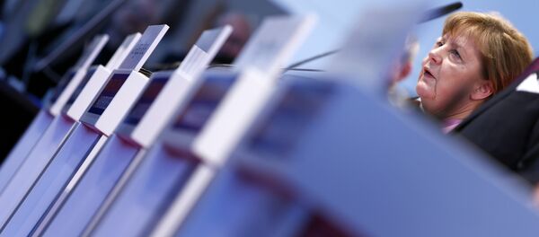 German Chancellor and head of the Christian Democratic Union (CDU) Angela Merkel addresses a news conference after a meeting at the International Trade Fair in Munich, Germany, February 26, 2016. German Chancellor and head of the Christian Democratic Union (CDU) Angela Merkel addresses a news conference after a meeting at the International Trade Fair in Munich, Germany, February 26, 2016. - Sputnik International