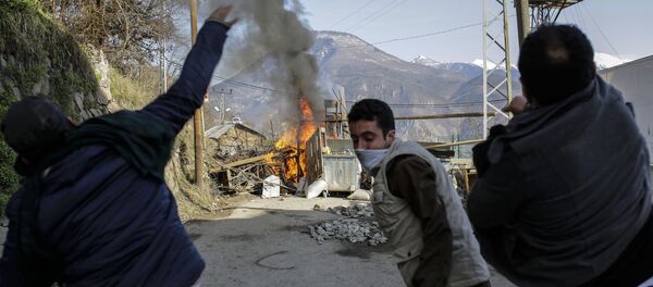 Turkish people clash with riot police during a protest against mine project on February 17, 2016, in northern Turkish city of Artvin Turkish people clash with riot police during a protest against mine project on February 17, 2016, in northern Turkish city of Artvin - Sputnik International