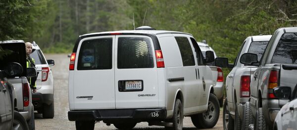A Mason County Coroner's van arrives at the scene of a fatal shooting Friday, Feb. 26, 2016, near Belfair, Wash. A Mason County Coroner's van arrives at the scene of a fatal shooting Friday, Feb. 26, 2016, near Belfair, Wash. - Sputnik International