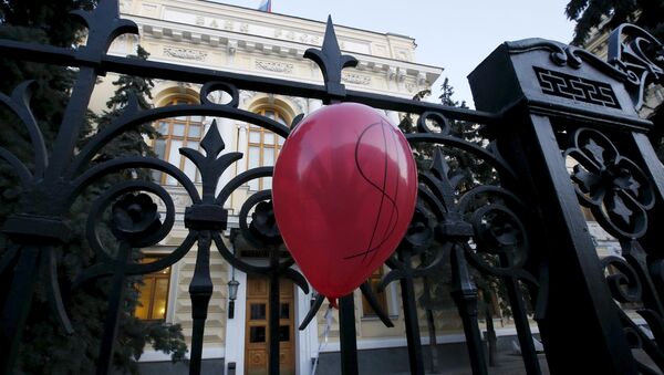 A balloon is seen during a rally of foreign currency mortgage holders near the Central Bank headquarters in central Moscow, Russia, February 8, 2016 - Sputnik International