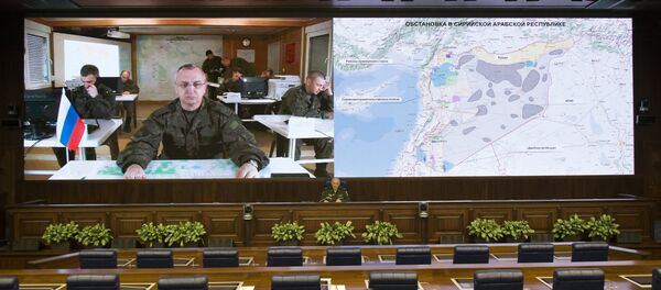 Lt.-Gen. Sergei Rudskoi of the Russian Military General Staff, background center, speaks to the media in Moscow, Russia, Saturday, Feb. 27, 2016 - Sputnik International