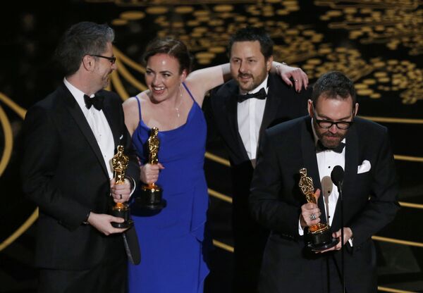 Mark Ardington, Sara Bennett, Paul Norris, and Andrew Whithurst hold their Oscars after winning Visual Effects for the movie Ex Machina at the 88th Academy Awards in Hollywood Mark Ardington, Sara Bennett, Paul Norris, and Andrew Whithurst hold their Oscars after winning Visual Effects for the movie Ex Machina at the 88th Academy Awards in Hollywood - Sputnik International