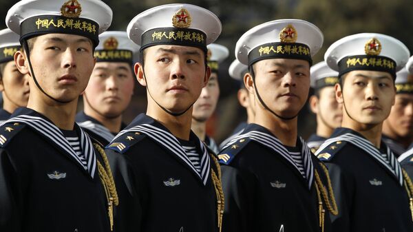 Members of a Chinese Navy honour guard wait for US Secretary of Defense Robert Gates to review the troops during a welcoming ceremony at Bayi Building in Beijing on January 10, 2011 - Sputnik International