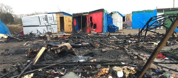 Jungle migrant camp in the French northern port city of Calais Jungle migrant camp in the French northern port city of Calais - Sputnik International