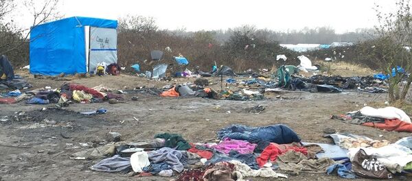 Jungle migrant camp in the French northern port city of Calais Jungle migrant camp in the French northern port city of Calais - Sputnik International