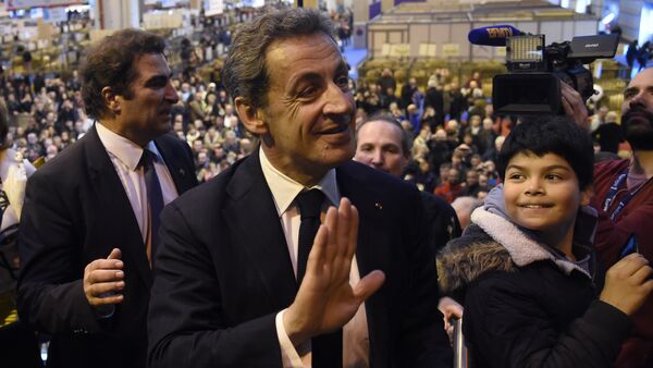 French right-wing Les Republicains (LR) party President, Nicolas Sarkozy (C) waves as he visits the Salon de l'Agriculture (Agriculture Fair), in Paris - Sputnik International