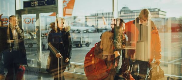 Passengers at an airport Passengers at an airport - Sputnik International