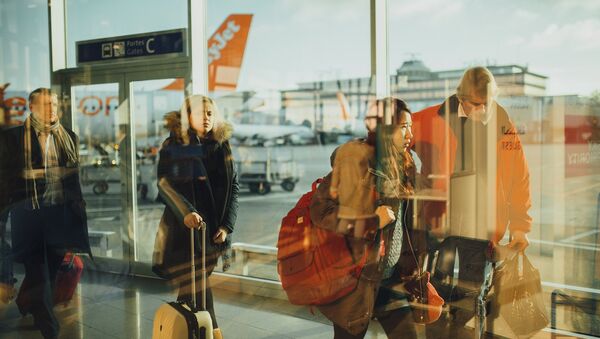 Passengers at an airport - Sputnik International