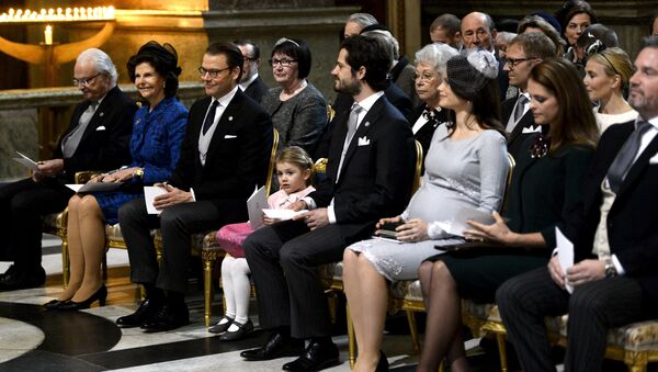Front row from left, Sweden's King Carl Gustaf, Queen Silvia, Prince Daniel, Princess Estelle, Prince Carl Philip, Princess Sofia, Princess Madeleine and Christopher O'Neill attend a thanksgiving service for the newborn prince in the palace church at Stockholm Royal Palace, March 3, 2016 - Sputnik International