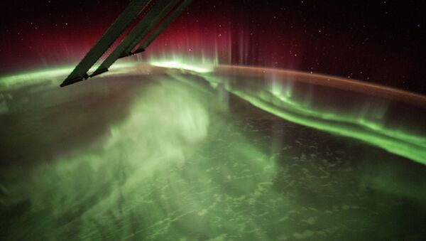 This Night Earth Observation of an Aurora Borealis was captured by NASA astronaut Scott Kelly of Expedition 44 on the International Space Station - Sputnik International
