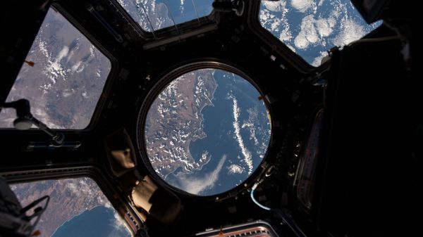 NASA astronaut Scott Kelly on the International Space Station took this Earth observation photo in the stations cupola that provides a 360 degree view. He tweeted this image with the comment: The view out my window.  - Sputnik International
