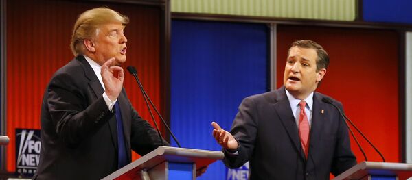 Republican presidential candidates, businessman Donald Trump and Republican presidential candidate, Sen. Ted Cruz, R-Texas, argue a point during a Republican presidential primary debate at Fox Theatre, Thursday, March 3, 2016, in Detroit - Sputnik International