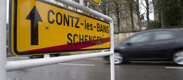 In this photo taken on Thursday, Feb. 4, 2016, a car drives out of Schengen, Luxembourg and into Contz-les-Bains, France In this photo taken on Thursday, Feb. 4, 2016, a car drives out of Schengen, Luxembourg and into Contz-les-Bains, France - Sputnik International