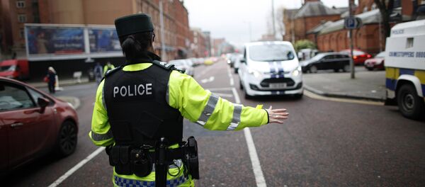 A police officer checks vehicles in South Belfast, Northern Ireland. File photo A police officer checks vehicles in South Belfast, Northern Ireland. File photo - Sputnik International